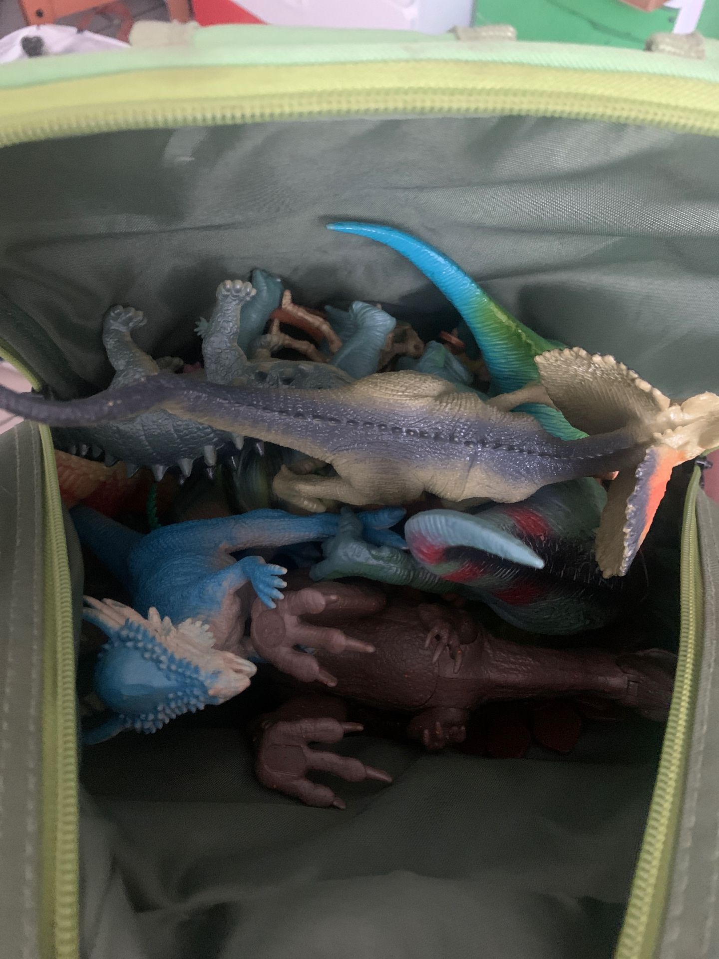 Toy dinosaur backpack