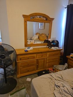 King sized bedroom set...armoire bed..2 night tables and large dresser