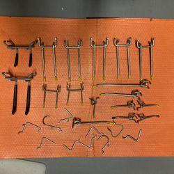 Hooks And Assorted Hardware For Peg Board Organize Your Tool Bench. 