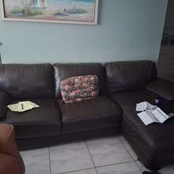 Dark brown leather sectional- Cindy Crawford