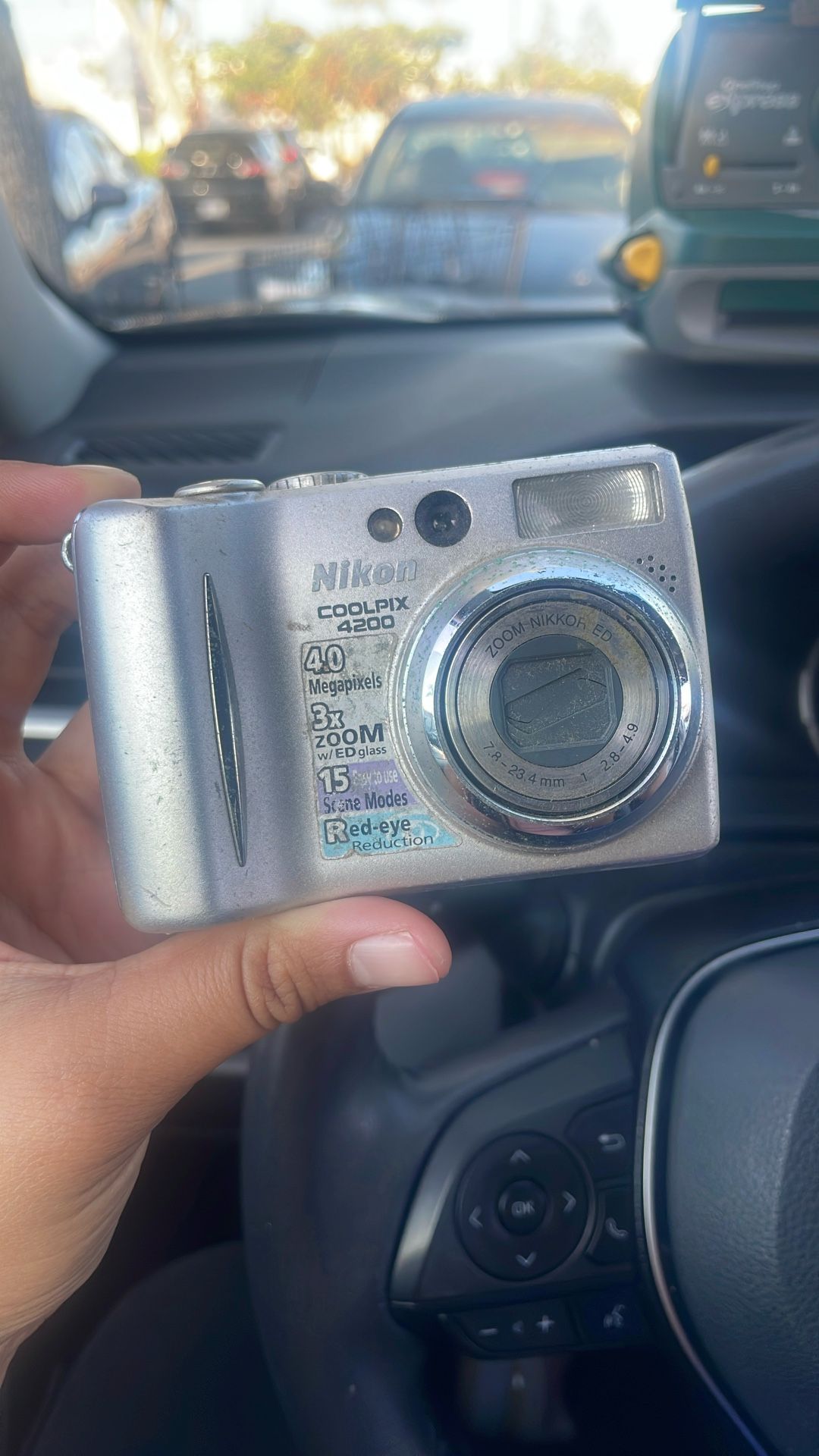 Nikon (working) *needs a battery & memory card