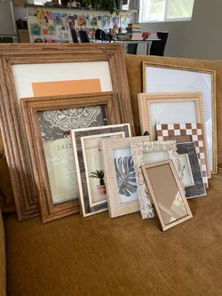 Assorted Collection of 10 picture frames ranging from 4 - 17 inches