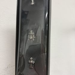 Black, personalized tie with inlays.