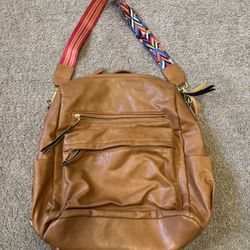 Brown Leather Backpack with Colorful Strap