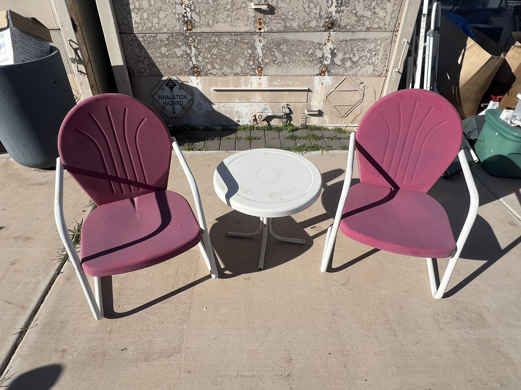 Two Metal Clam Shell Chairs With End Table