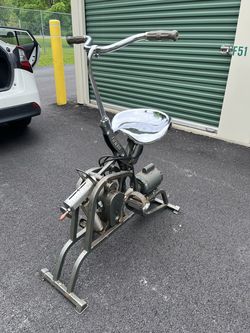 Exercycle motorized stationary exercise bike