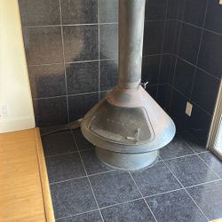 1960’s Mid century modern cone Fire Place.  Original Screen And Pipe. It Is A majestic