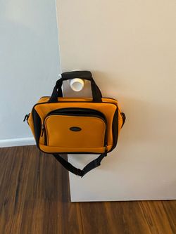 U.S. Traveler Rio mustard-colored softside travel tote bag