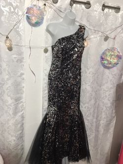 Used once Mermaid sequin black and silver dress size small 28 inch waist tulle bottom
