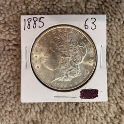 1885 E. Plurlbus Unum Silver Coin