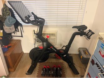 Peloton Bike – Excellent Condition – Includes 2 pairs of Shoes & Weights