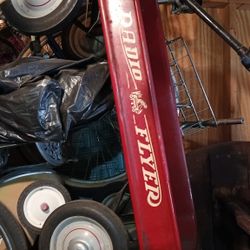 Vintage Radio Flyer Wagon for children baby moving items..see our art antiques jewelry furniture sports collectibles now posted.