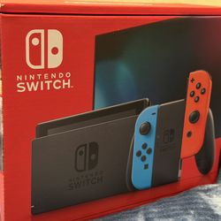 Nintendo Switch With Neon Blue Neoleon Red Joy