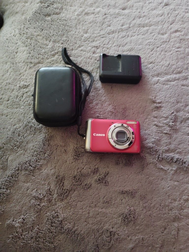 Canon Camera 12.1 Megapix +Video Recording And Battery Charger