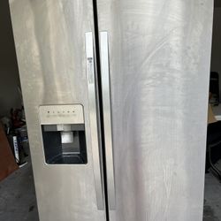 Kitchen Table, Stainless Steel Refrigerator And Washer And Dryer 