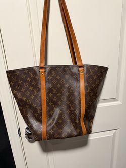 luxury leather & canvas hand bags