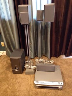 Pioneer surround sound 6 speakers with 5 disk DVD/cd changer. Everything works!!