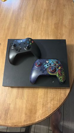Xbox One X Console with Two Controllers