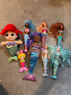 Bunch of mermaid toys