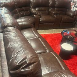Brown leather reclining sofa