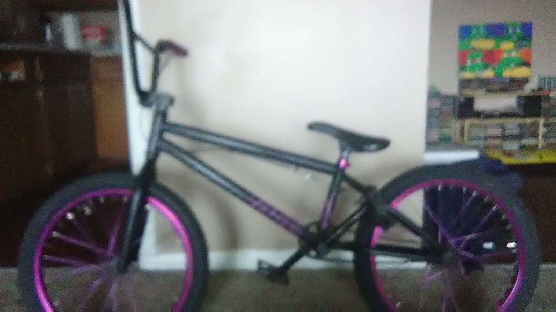 Purple and black bmx bike
