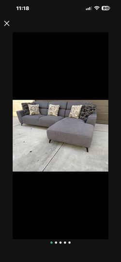 sectional Couch Living Space Is Excellent Condition No Stains, Rips Burnt Pet
