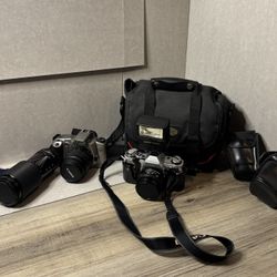 2 Cameras Canon AE-1 35mm and Canon EOS Rebel XSn 35mm w/ case, light, and strap