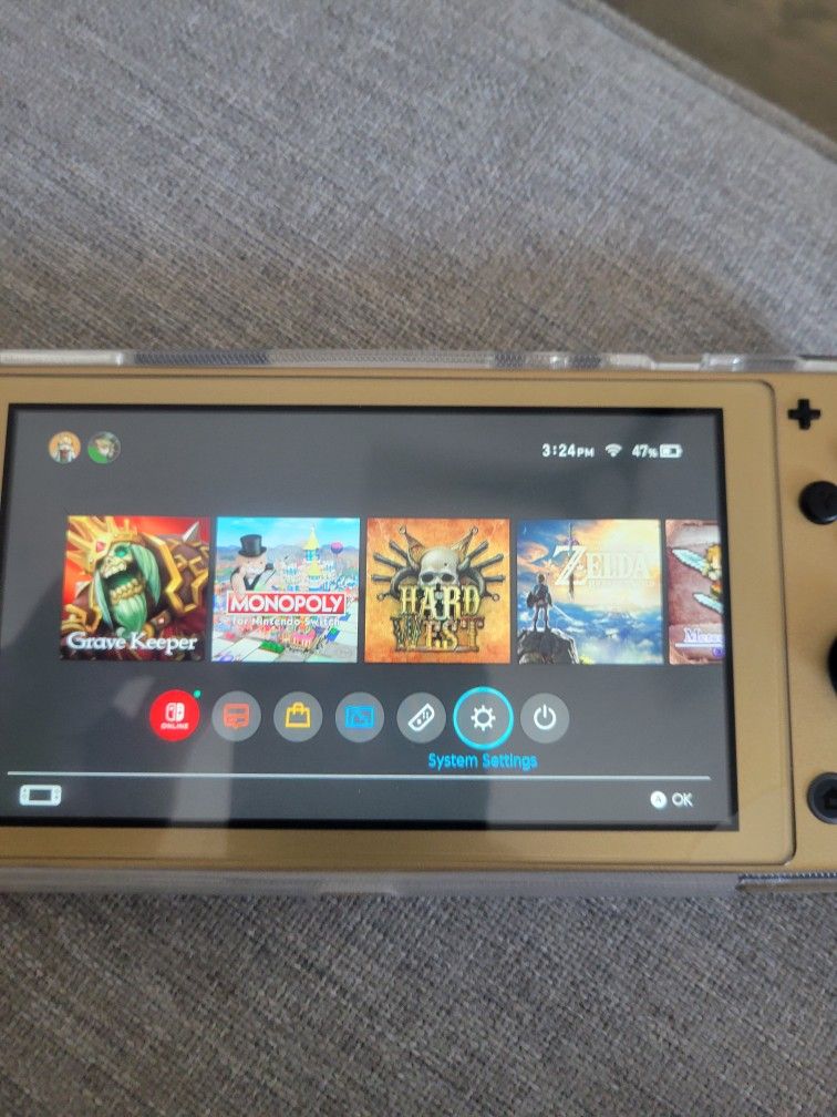 Nintendo Switch Lite Zelda Hyrule With One Year Subscription Voucher