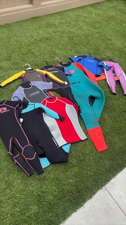 Wetsuit lot variety of sizes and styles