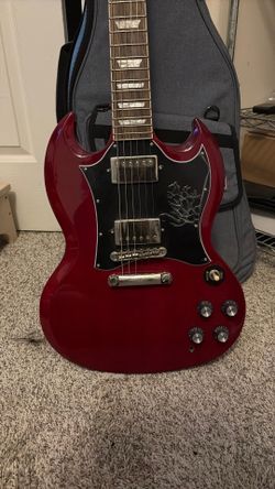 Epiphone SG Cherry Red (plastic still on face)