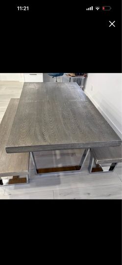Dining table with two barstools