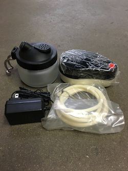 New in box $20 mini airbrush compressor with glass cleaning pot air hose