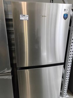 New Frigidaire stainless steel top and bottom refrigerator and services