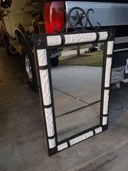 Mirrors with detachable star