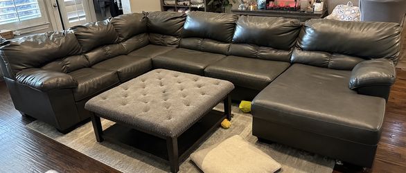 Leather Sectional, Ottoman And Area Rug