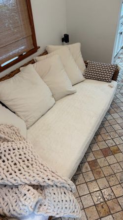 Cream Upholstered Sofa with Rattan Frame