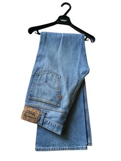 517 s Orange Tab Levi’s 31