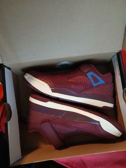 Jordan Spizike Low shoes in a Bordeaux/Hyper Royal-Sail colorway.