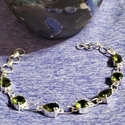 Silver Adjustable Bracelet With Peridot Stones 