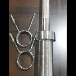 New Olympic 7ft Barbell. Includes Clips
