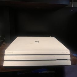 PS4 Console w/controllers & charging stand