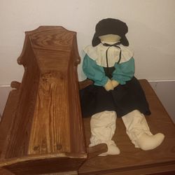 Amish doll and wooden bed