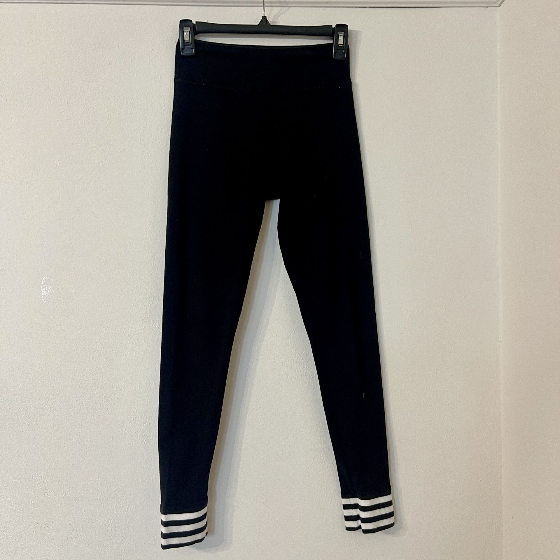 Adidas Women’s Legging size small black with white stripes on bottom