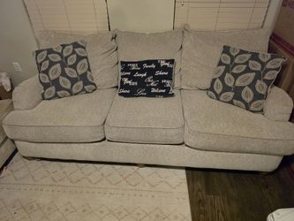 Beige Sofa with Decorative Pillows