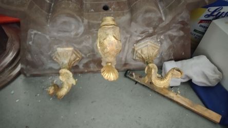 High end bathroom pedestal sink with 24k gold knobs.
