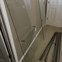 $375 *New* 30x58 1/2x1/4 PAIR OF GLASS SHOWER DOORS W/RAILS