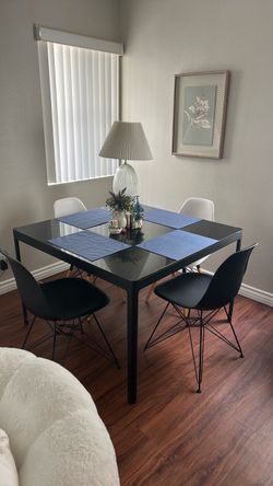 Square black dining/breakfast table + four chairs
