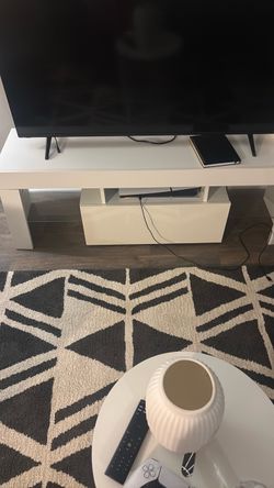 Tv stand with small center table and carpet make an offer