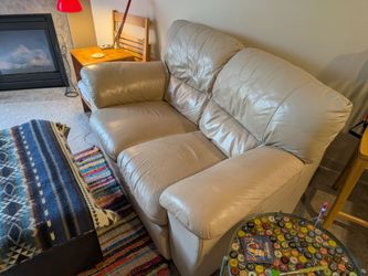 Leather loveseat and matching recliner