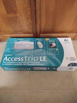 Logitech cordless keyboard, mouse, quick cam